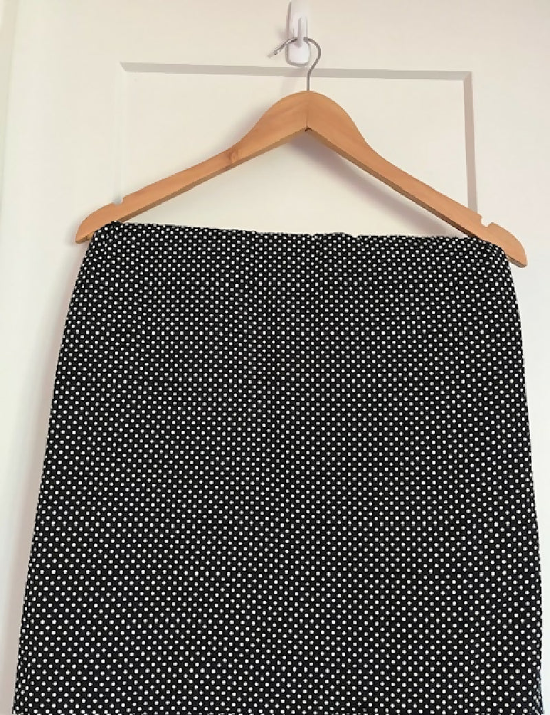 White polka dots on black - seersucker fabric