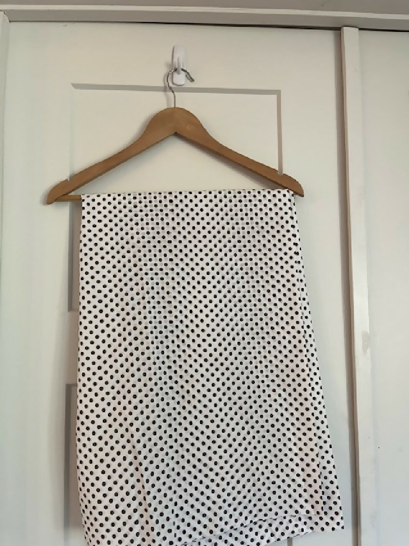 Brown polka dots on white