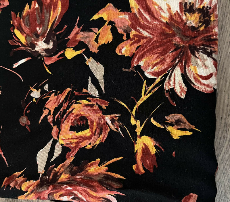 Floral rayon crêpe, black/rust/orange 1.5 yards