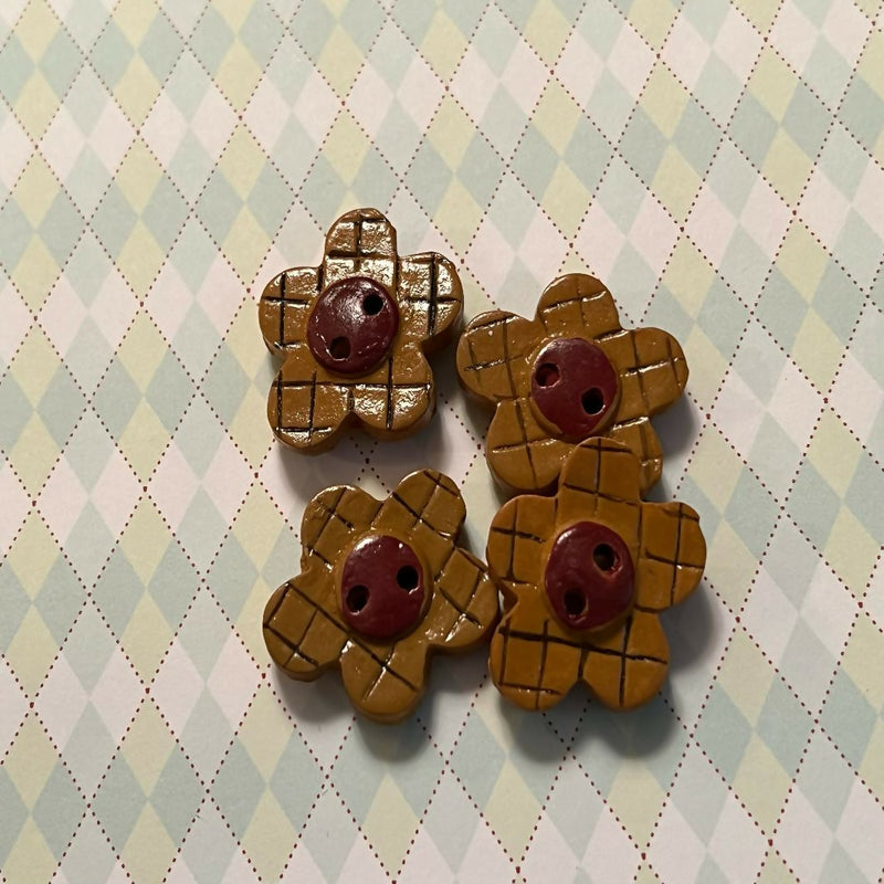 Novelty buttons - brown resin flowers
