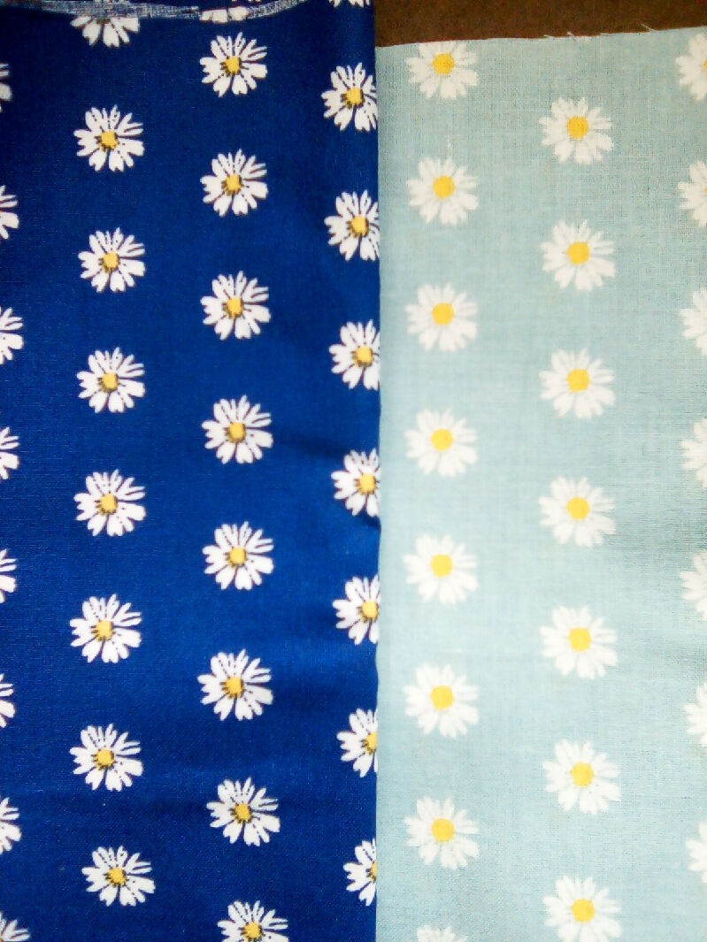 Cotton material, blue, green, black, pink, daisy designs, 9in x 43in all 8 pieces, fabric