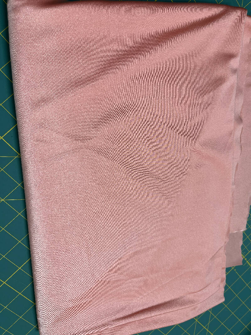 Melon pink nylon/Lycra shiny activewear knit