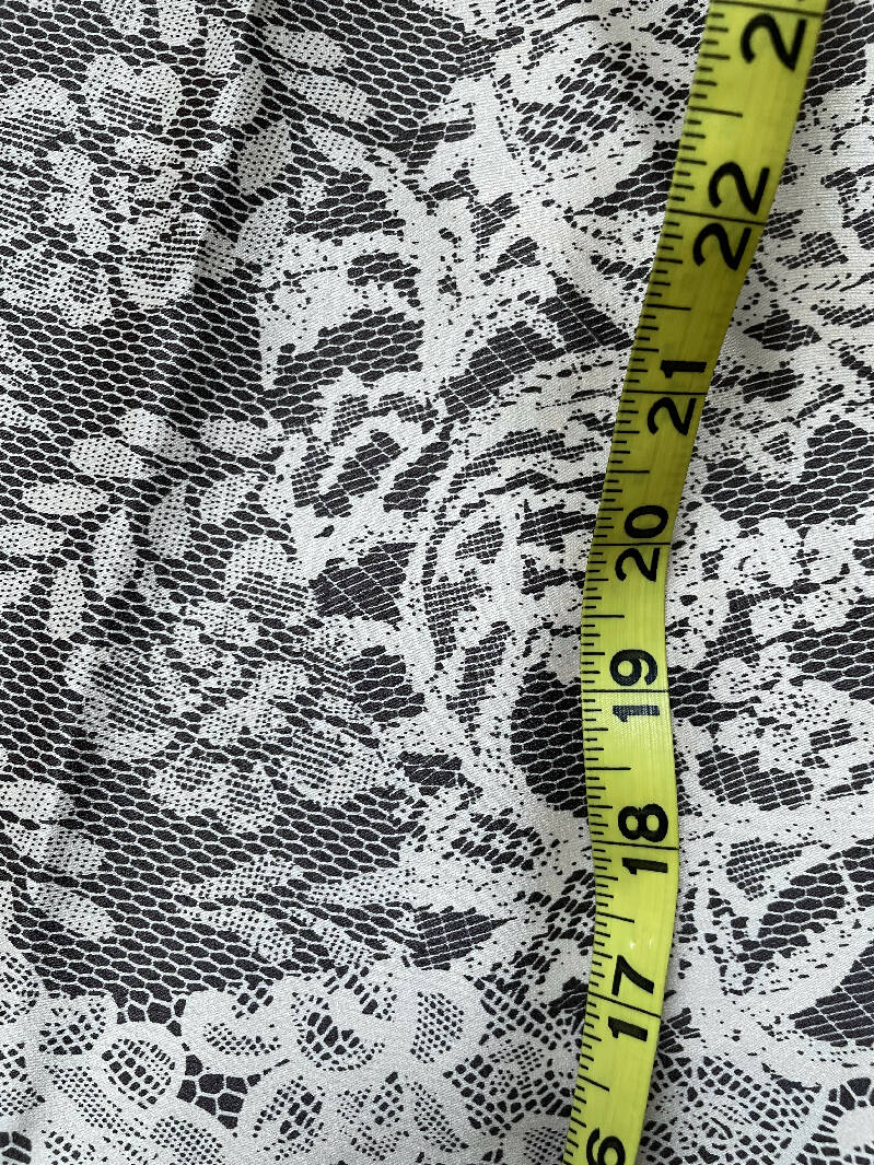 Brown and ecru lace print polyester, 1.75 yd
