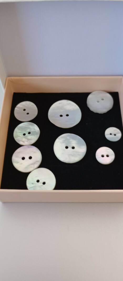 9 Mother of Pearl Buttons, various sizes