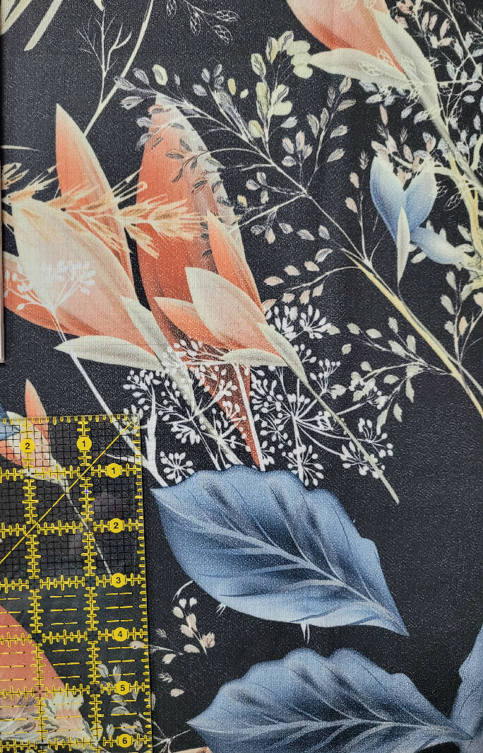 Black pebbled crepe floral with peach and lt blue 1 1/2 + yds