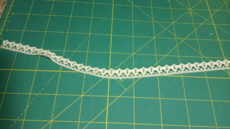 Cream colored 1/2" flat lace, 12 ft length