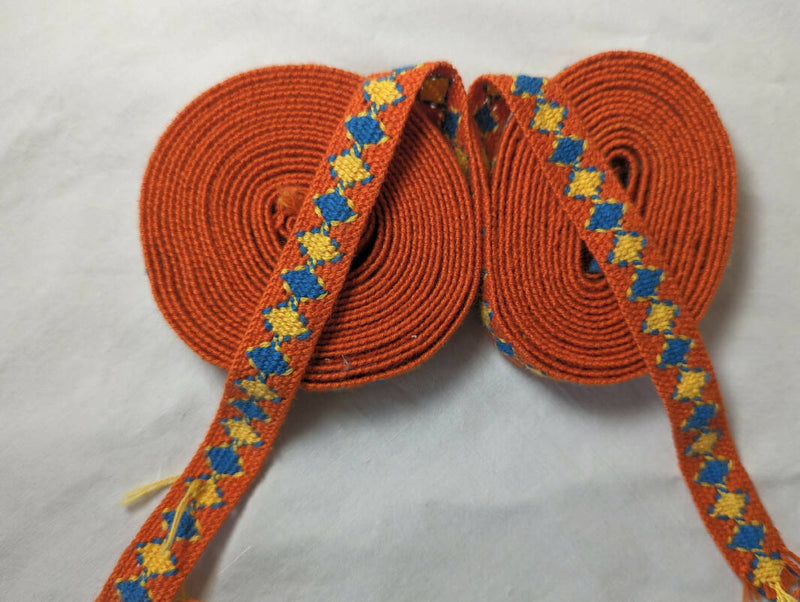 Woven cotton ribbon. 1/2" wide. Two pieces - 3 1/3 yards & 2 1/3 yards