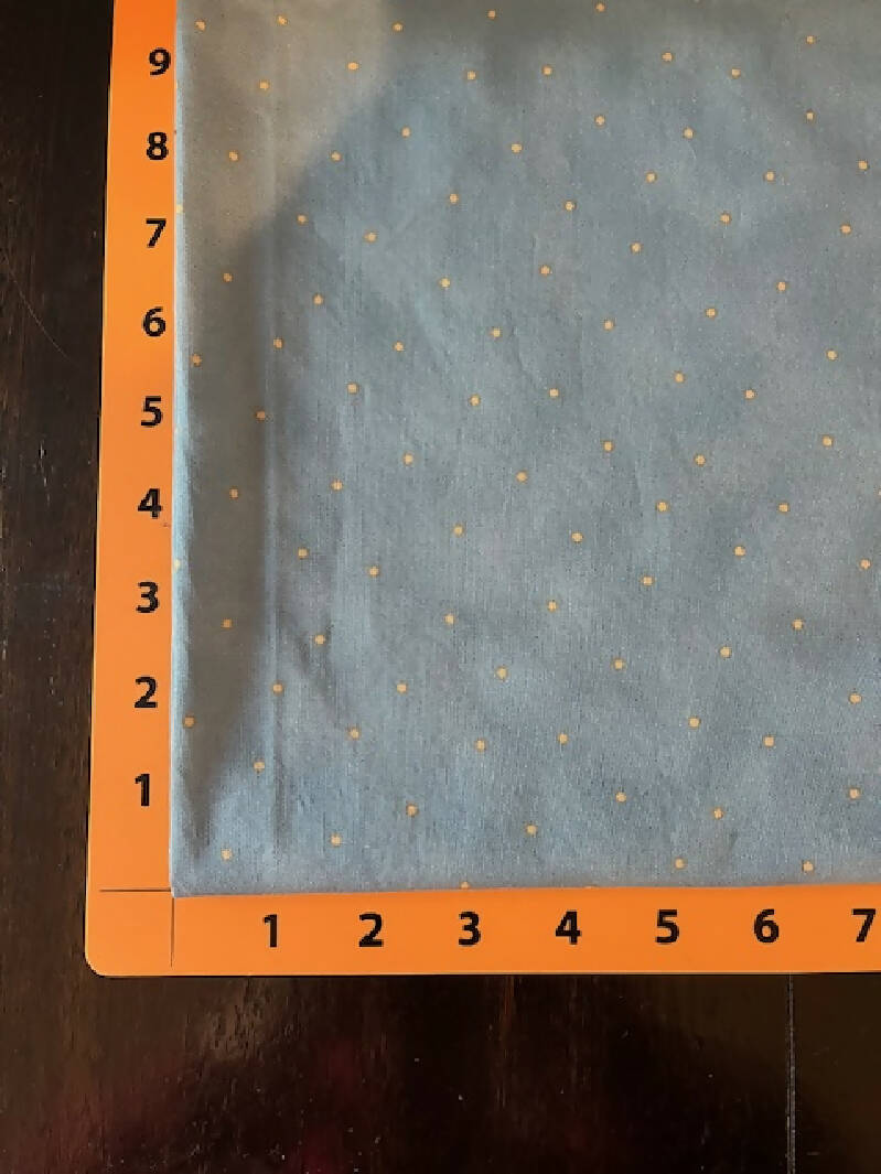 Light blue with yellow dots - "Simpatico" by Maywood Studio.