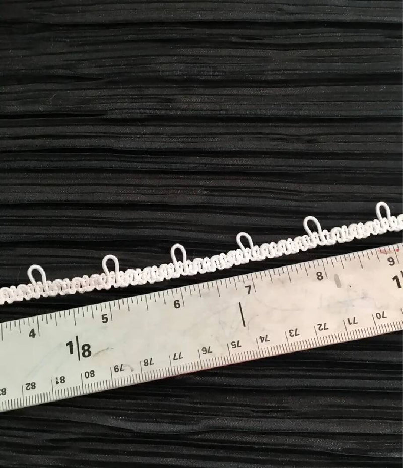 White elastic button looping trim