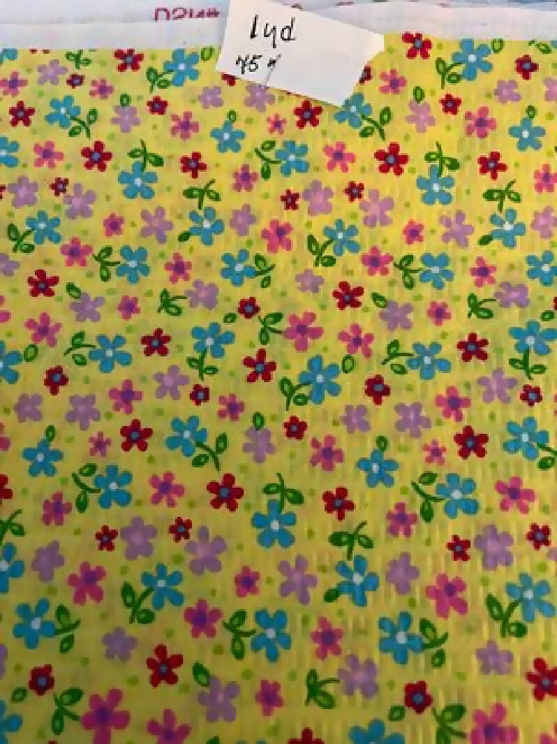 Seersucker yellow with multi color flowers 1 yd 45 wide