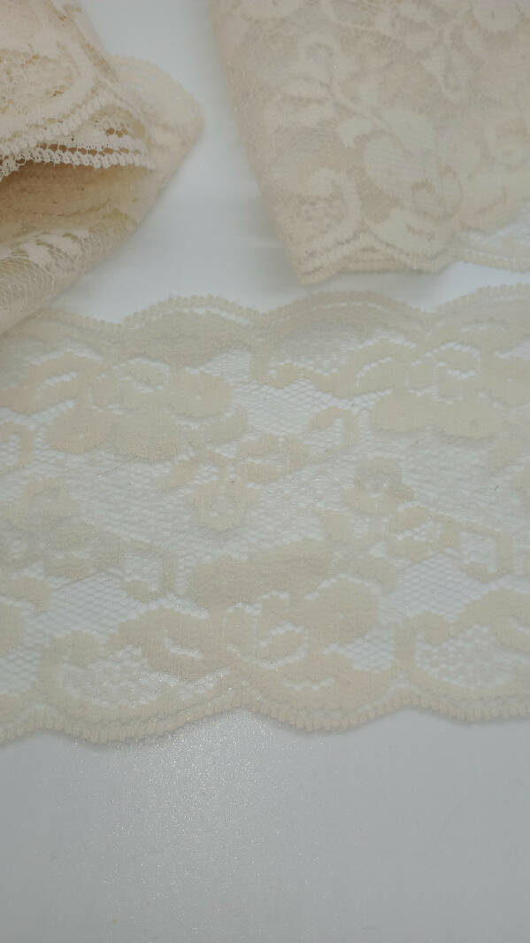 Cream colored lace, 3 1/2 in width, lot includes 2 pieces